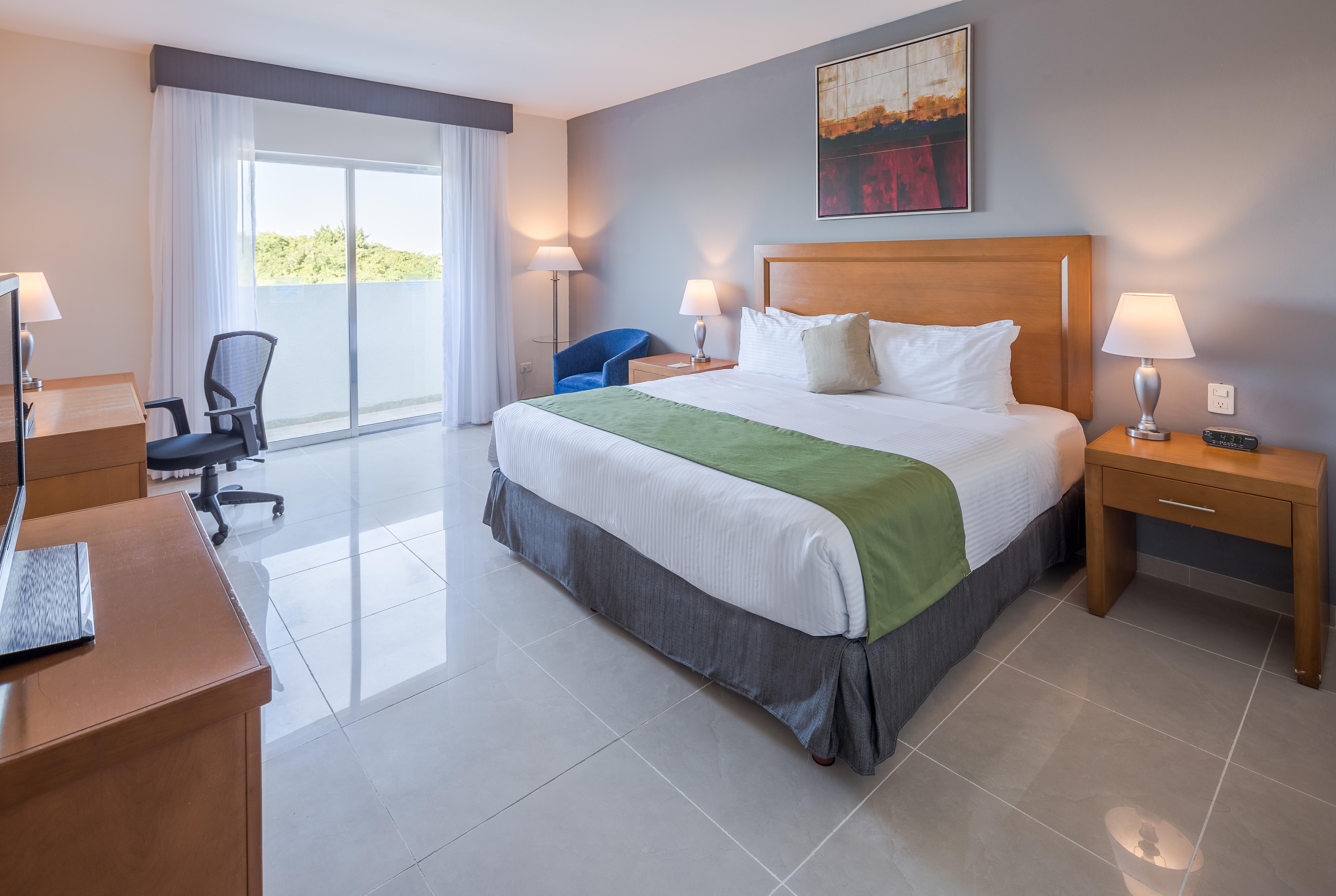 Wyndham Garden Playa Del Carmen Ξενοδοχείο Εξωτερικό φωτογραφία A typical room at the hotel