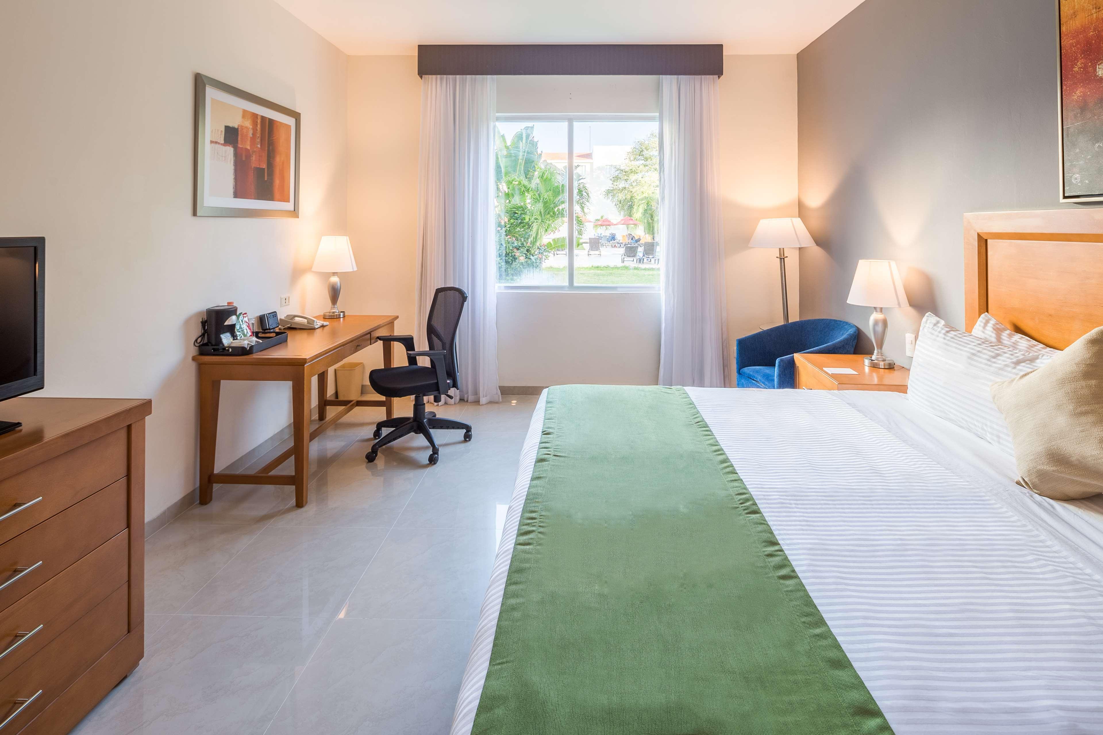 Wyndham Garden Playa Del Carmen Ξενοδοχείο Εξωτερικό φωτογραφία A typical room at the hotel