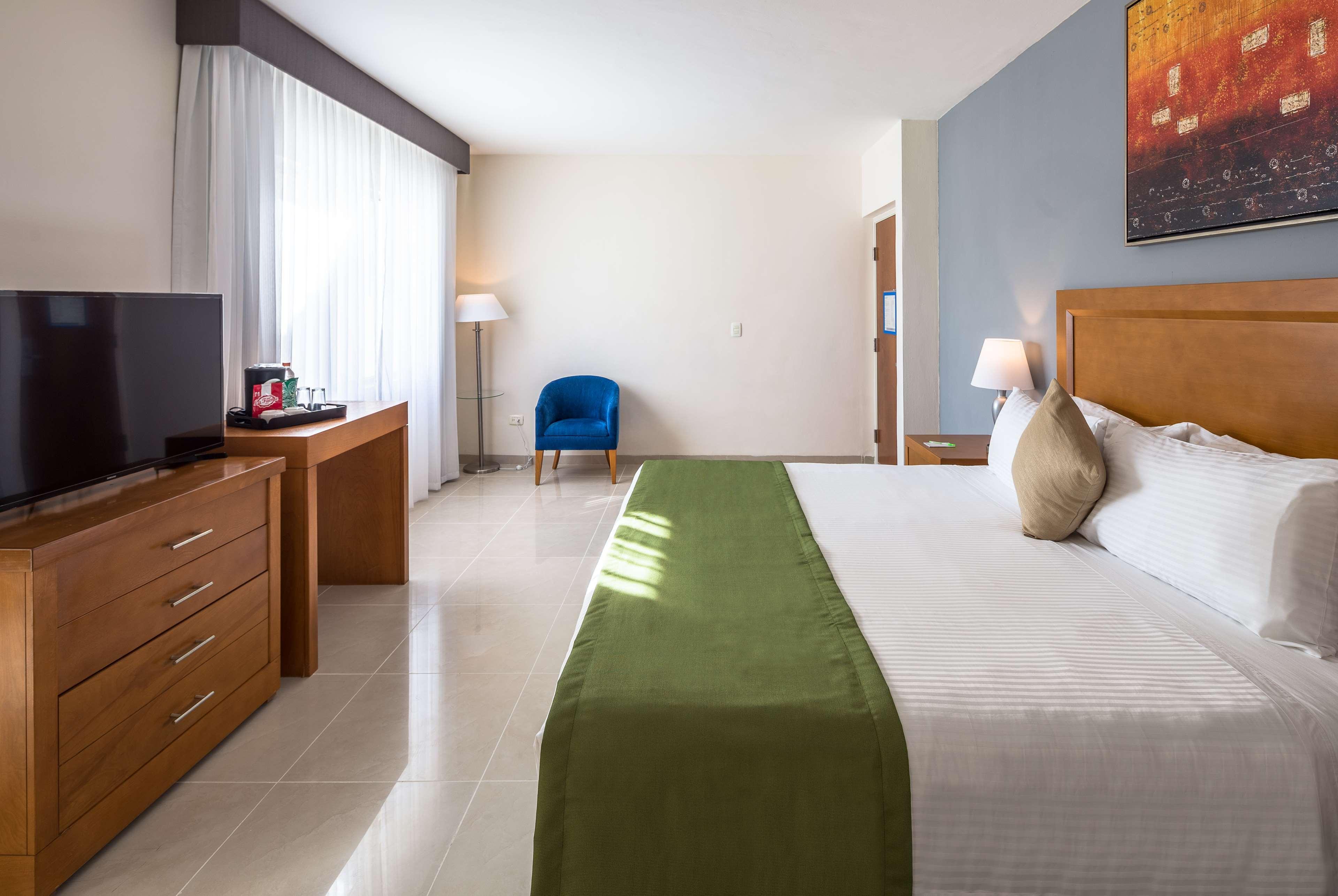 Wyndham Garden Playa Del Carmen Ξενοδοχείο Εξωτερικό φωτογραφία A room at the hotel